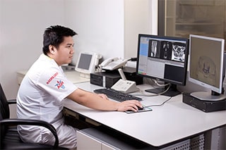 radiology staff imaging a patient