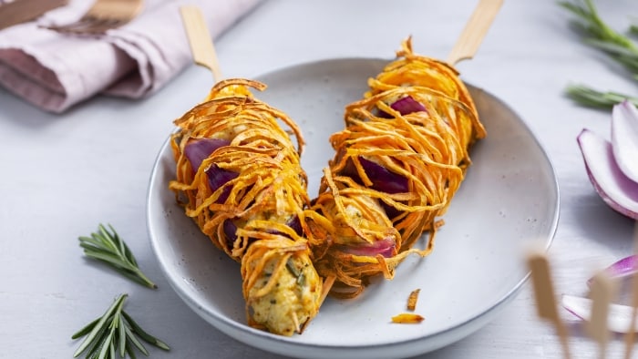 Crispy chicken skewers with spaghetti