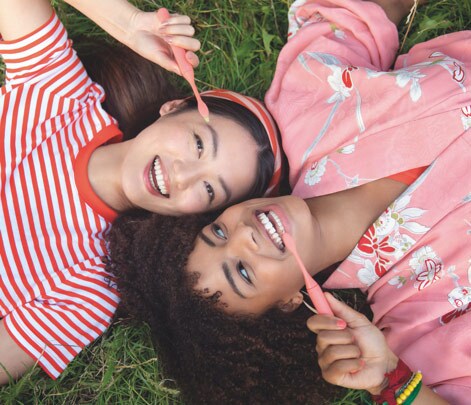 Two girls smiling